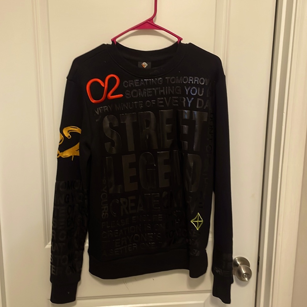 Black orange and red size small long sleeve T shirt